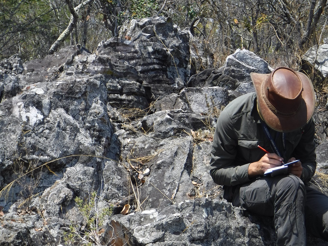 Recording geological observations in the field, DR Congo